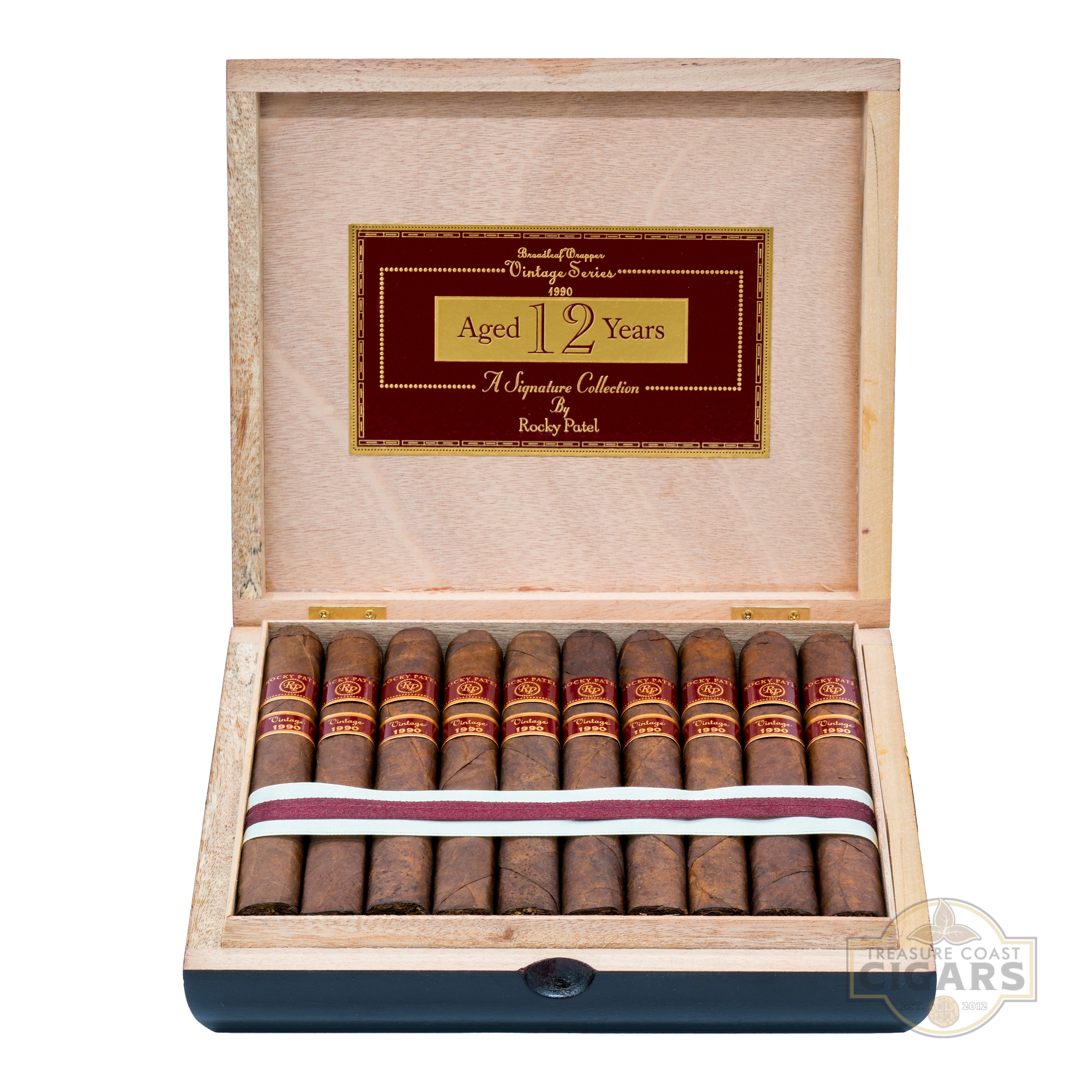 Open wooden cigar box with cigars and a visible brand logo on a white background