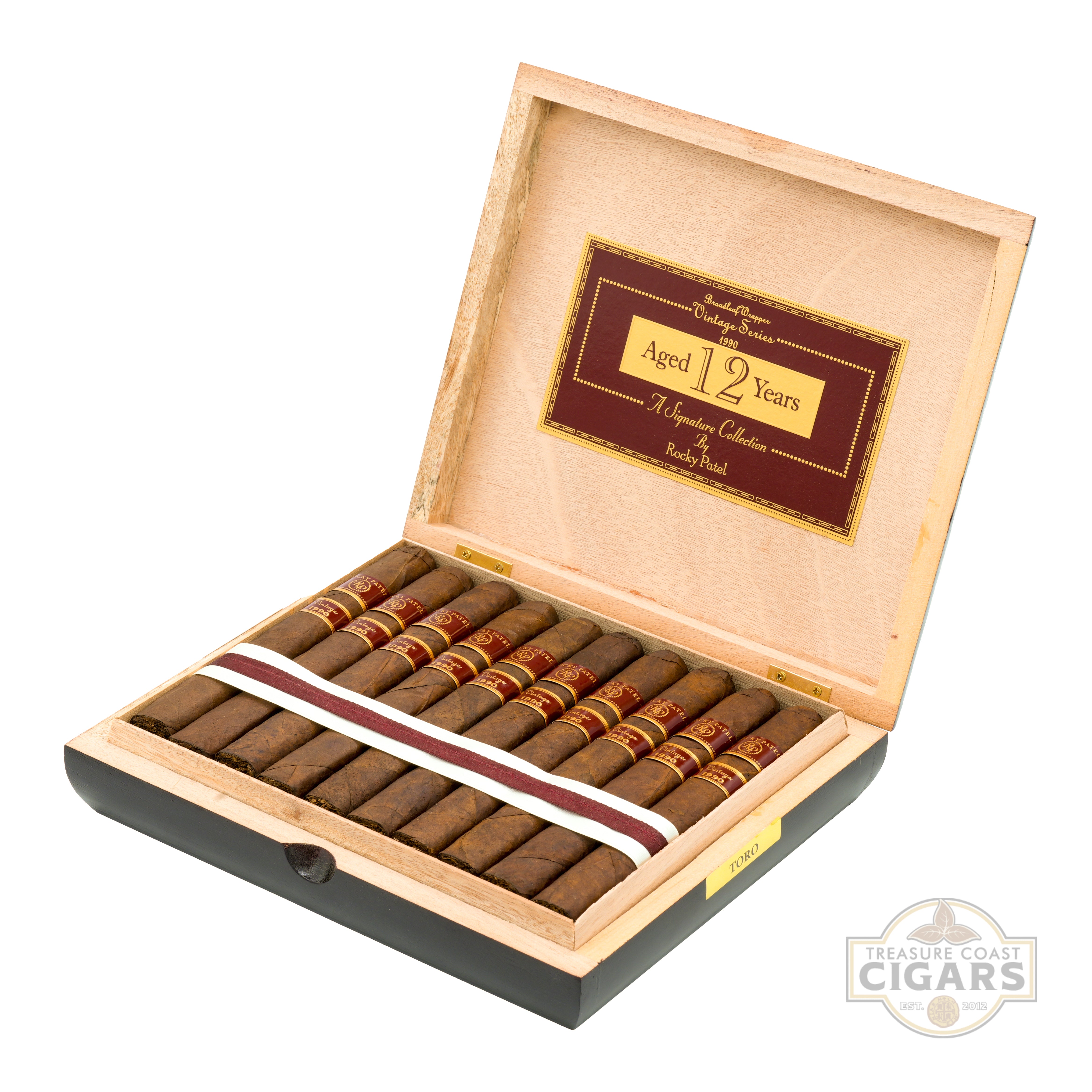 Open wooden box of aged cigars with a visible brand logo on a white background