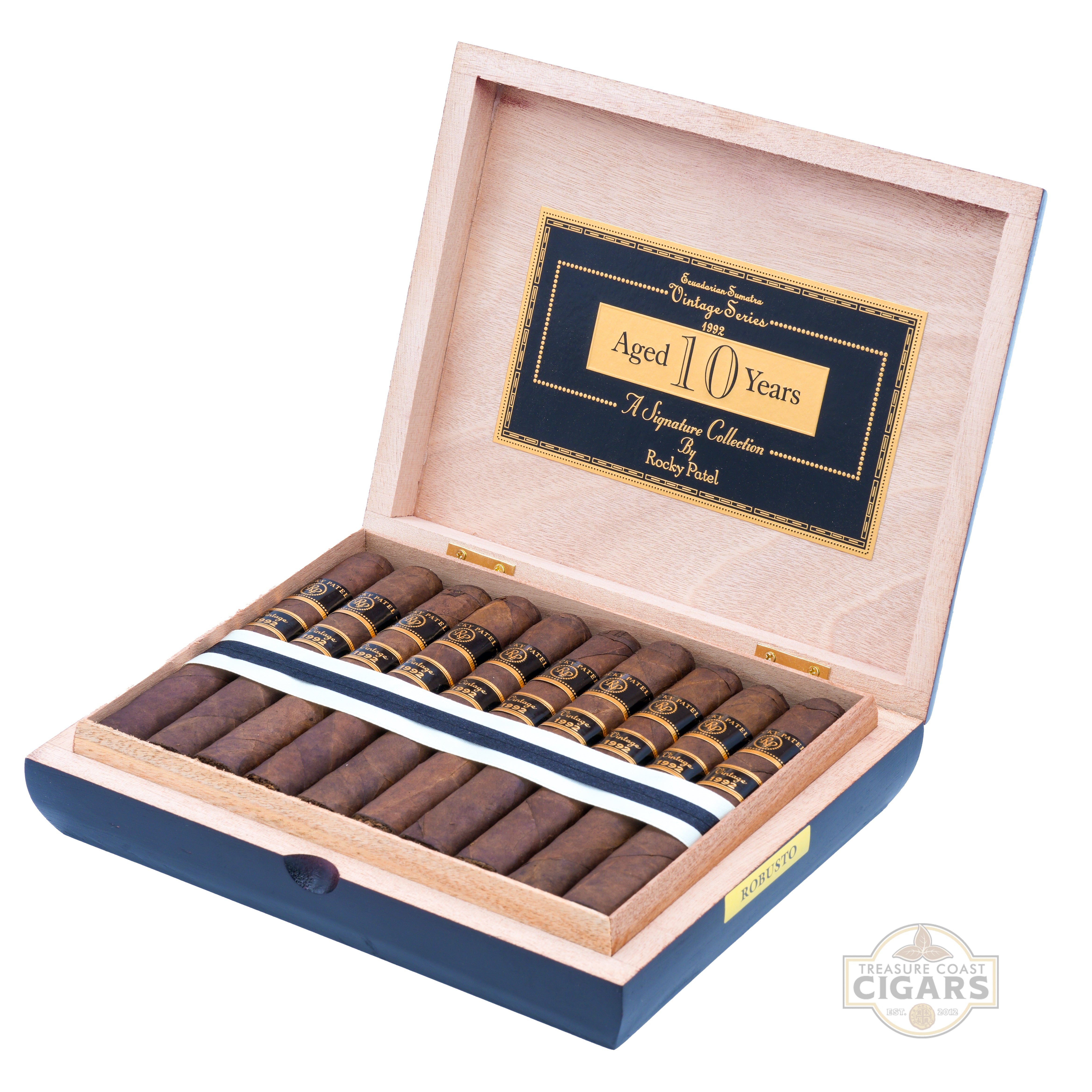 Open wooden cigar box with cigars inside, featuring a label indicating 'Aged 10 Years'.