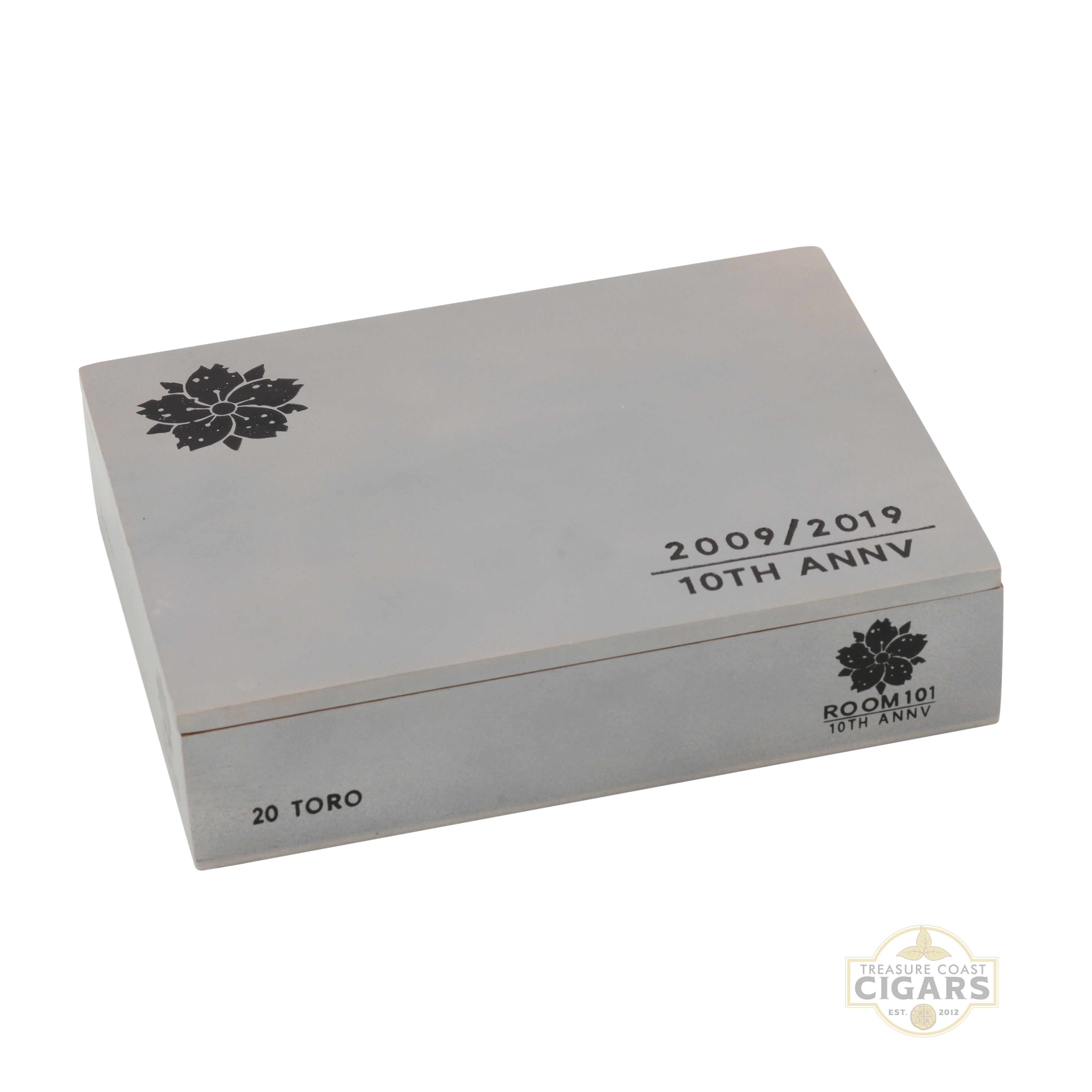Cigar box with '2009/2019 10th Anniv' and 'Room 101' branding on a white background