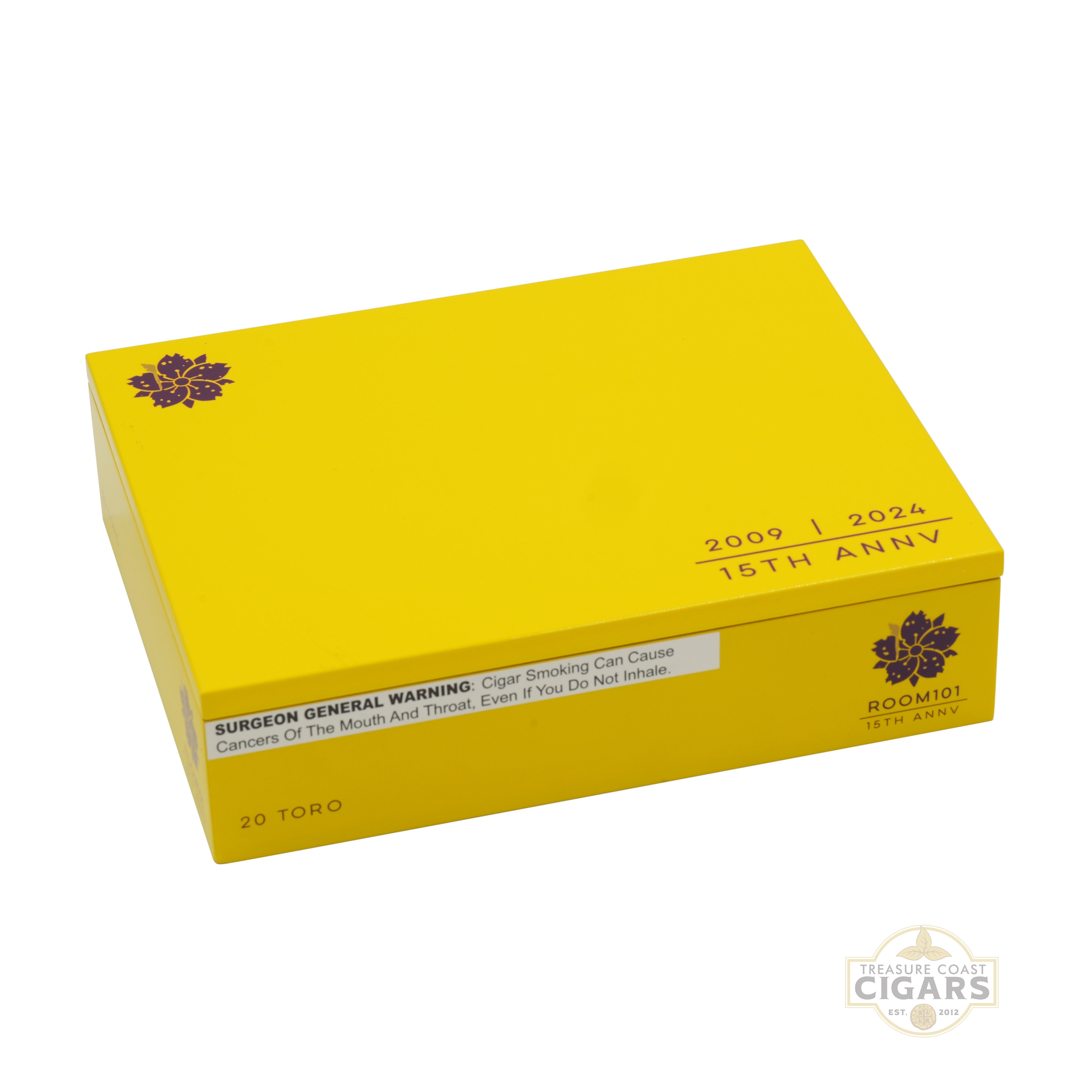Room 101 15th Anniversary Yellow cigar box with branding and warning label on a white background