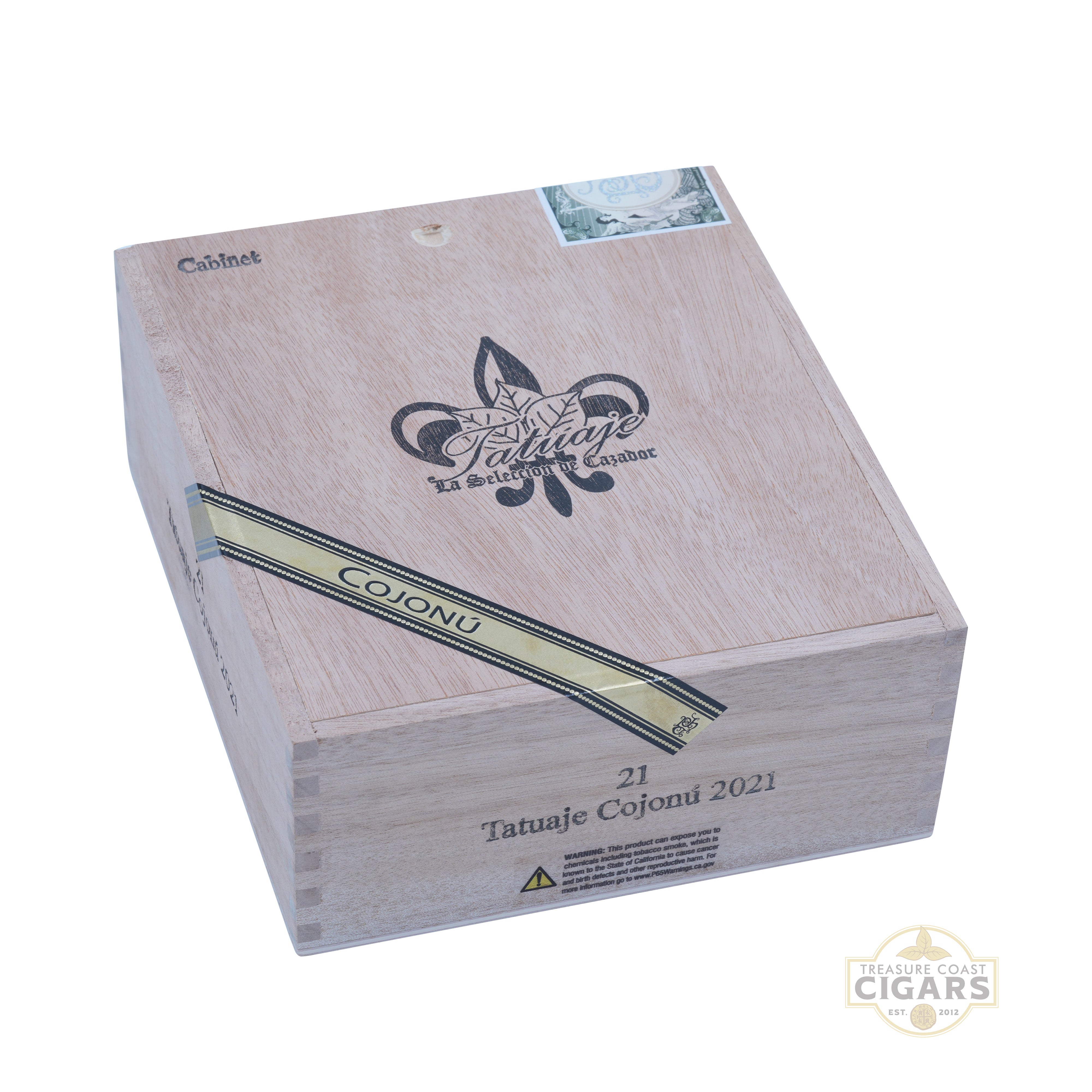 Cigar box with Tatuaje logo and 'Cojonu' branding on a white background
