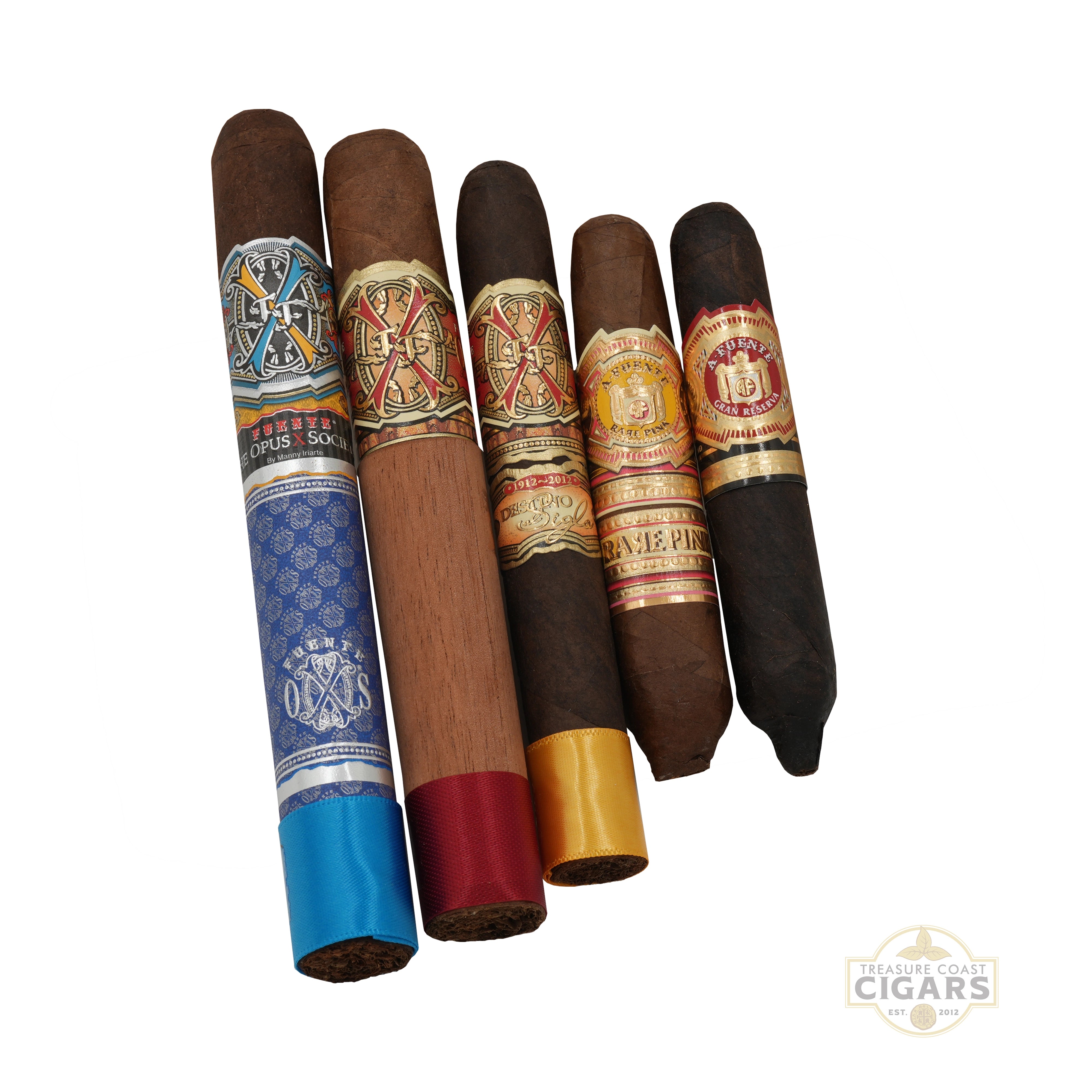Five cigars arranged vertically on a white background, each with a different decorative band showing various colors and designs. A small 'Treasure Coast Cigars' logo is visible in the bottom right corner.